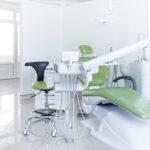 A modern green dental chair setup in a new practice.