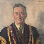 A close up of a painting of Edward in his RCSI dress robes by Margaret Clarke.